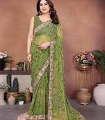 Comely green sequins embroidered georgette festival saree