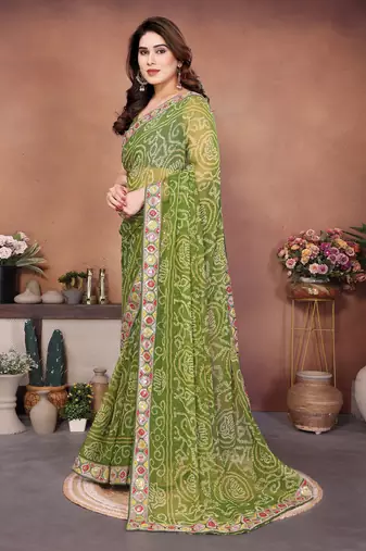 Comely green sequins embroidered georgette festival saree