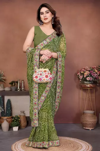 Comely green sequins embroidered georgette festival saree