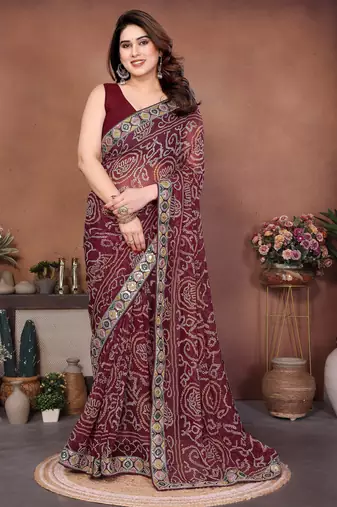Captivating maroon sequins embroidered georgette traditional wedding saree