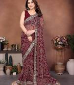 Captivating maroon sequins embroidered georgette traditional wedding saree
