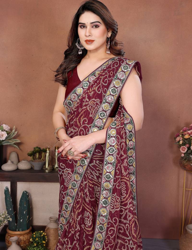 Captivating maroon sequins embroidered georgette traditional wedding saree