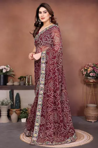 Captivating maroon sequins embroidered georgette traditional wedding saree