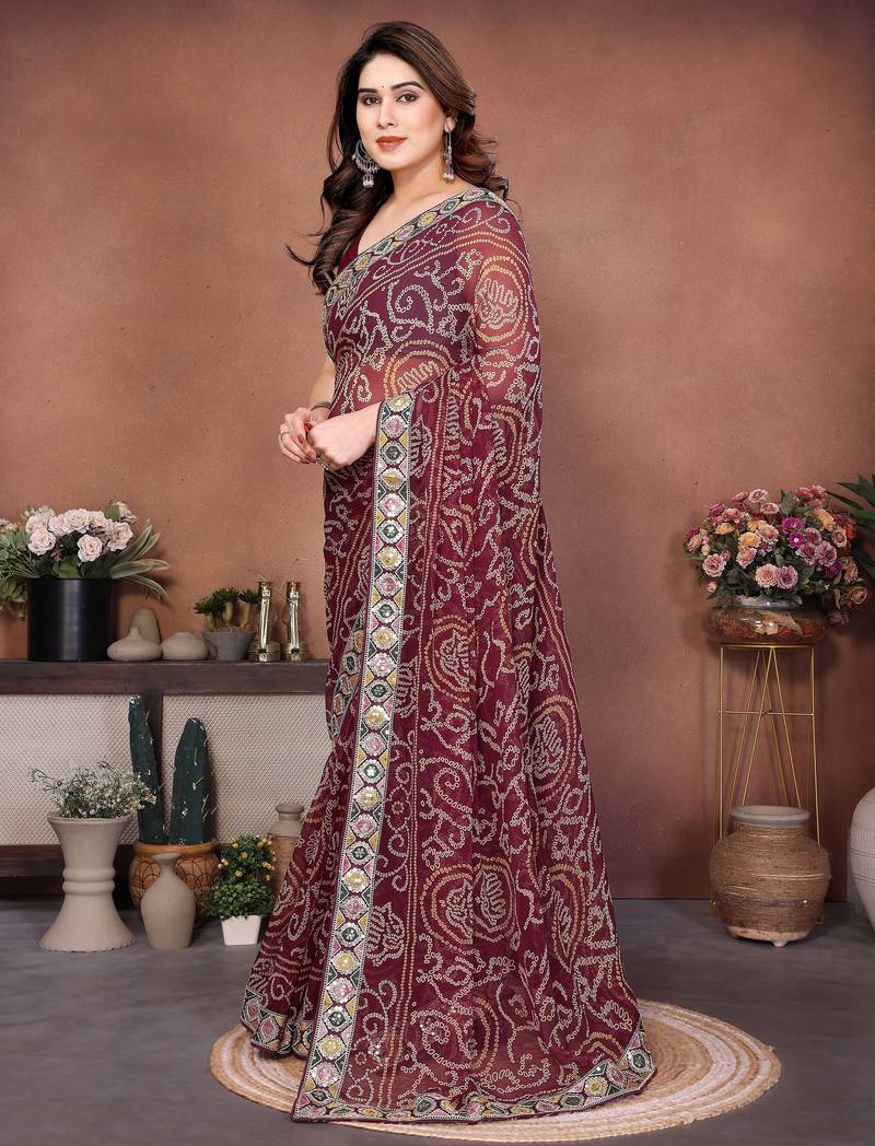 Captivating maroon sequins embroidered georgette traditional wedding saree