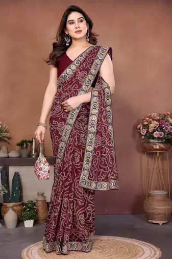 Captivating maroon sequins embroidered georgette traditional wedding saree