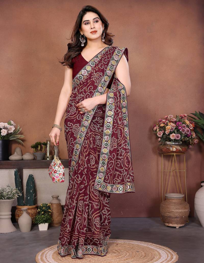 Captivating maroon sequins embroidered georgette traditional wedding saree