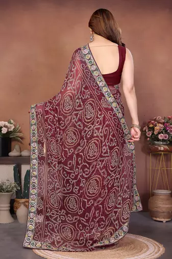 Captivating maroon sequins embroidered georgette traditional wedding saree