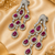 Rhodium Finish Ruby Cascade AD Earrings