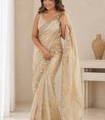 Engaging beige sequins embroidered with bits work frendy satin saree with blouse