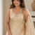 Engaging beige sequins embroidered with bits work frendy satin saree with blouse