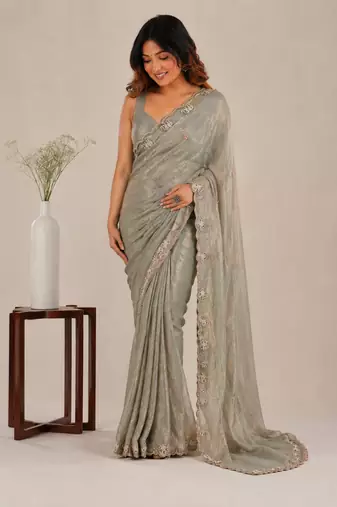 Alluring dusty pink sequins embroidered with bits work frendy satin party wear saree