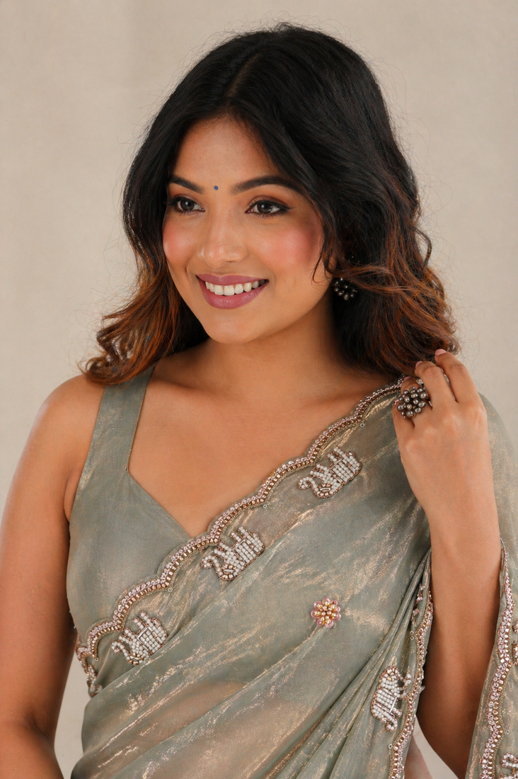 Alluring dusty pink sequins embroidered with bits work frendy satin party wear saree