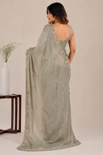 Alluring dusty pink sequins embroidered with bits work frendy satin party wear saree