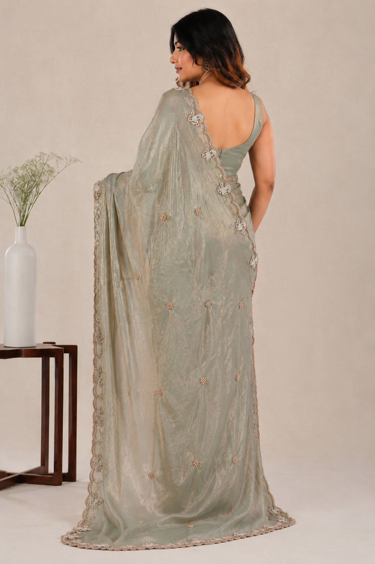 Alluring dusty pink sequins embroidered with bits work frendy satin party wear saree