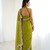Seductive olive green fancy lace border soft viscose jacquard butti silk designer wedding saree