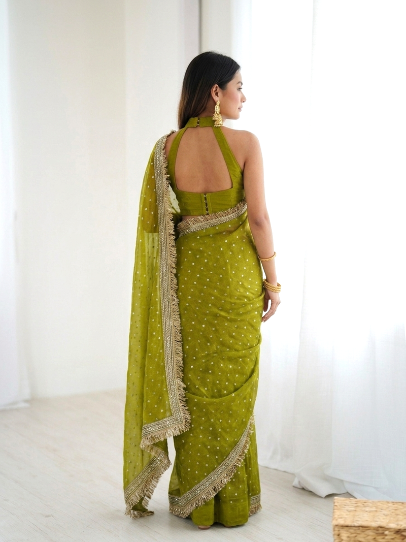 Seductive olive green fancy lace border soft viscose jacquard butti silk designer wedding saree