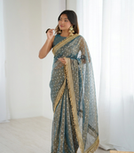 Ravishing teal blue fancy lace border soft viscose jacquard butti silk designer party wear saree
