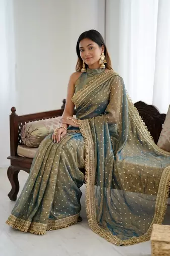 Ravishing teal blue fancy lace border soft viscose jacquard butti silk designer party wear saree