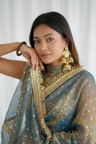 Ravishing teal blue fancy lace border soft viscose jacquard butti silk designer party wear saree