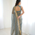 Ravishing teal blue fancy lace border soft viscose jacquard butti silk designer party wear saree