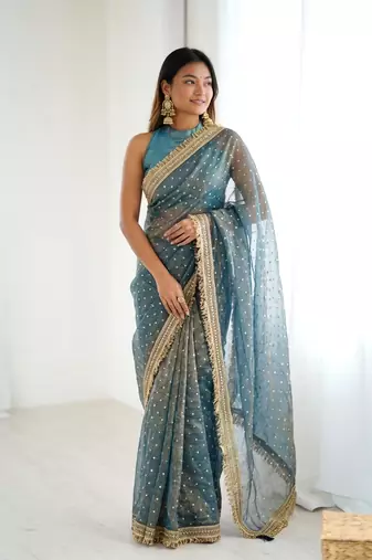Spellbinding sea-green fancy lace border soft viscose jacquard butti silk ceremonian saree