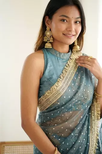 Spellbinding sea-green fancy lace border soft viscose jacquard butti silk ceremonian saree
