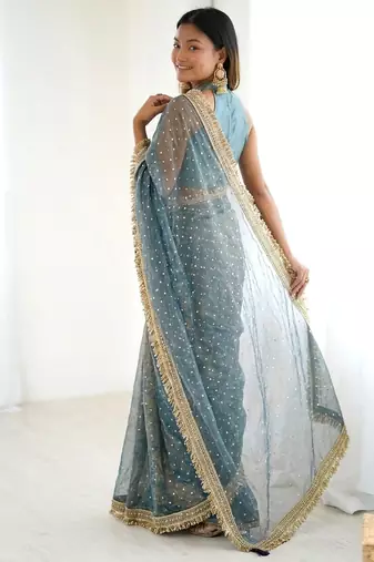 Spellbinding sea-green fancy lace border soft viscose jacquard butti silk ceremonian saree