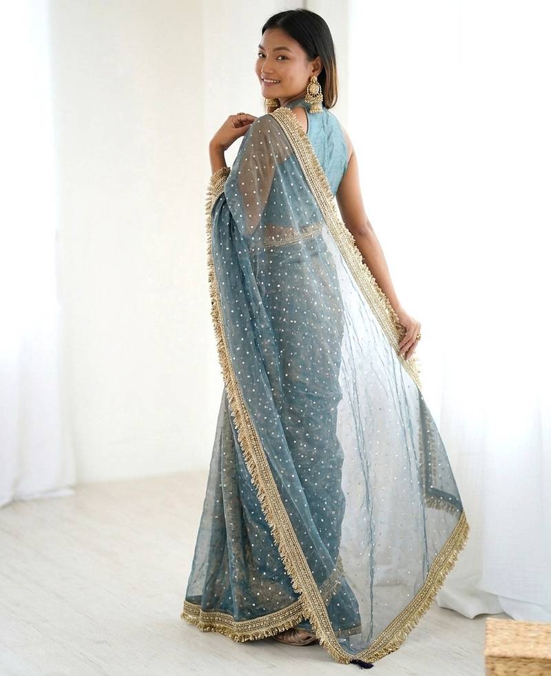 Spellbinding sea-green fancy lace border soft viscose jacquard butti silk ceremonian saree