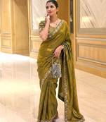 Entrancing green beads sequins and cut-dana embroidered fendy satin festival saree