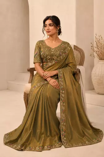 Entrancing green beads sequins and cut-dana embroidered fendy satin festival saree