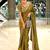 Entrancing green beads sequins and cut-dana embroidered fendy satin festival saree