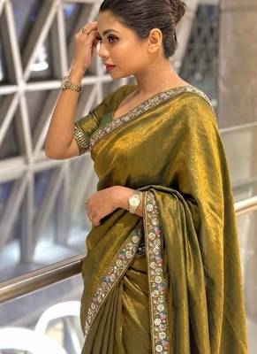 Entrancing green beads sequins and cut-dana embroidered fendy satin festival saree 5