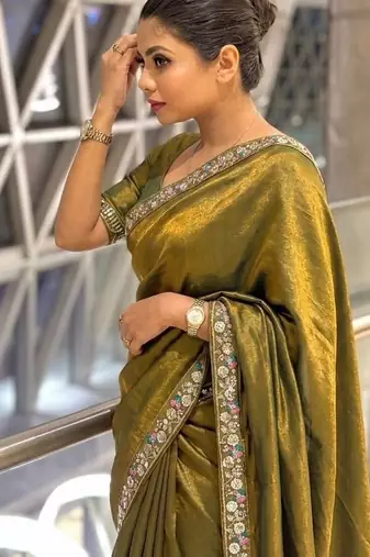 Entrancing green beads sequins and cut-dana embroidered fendy satin festival saree