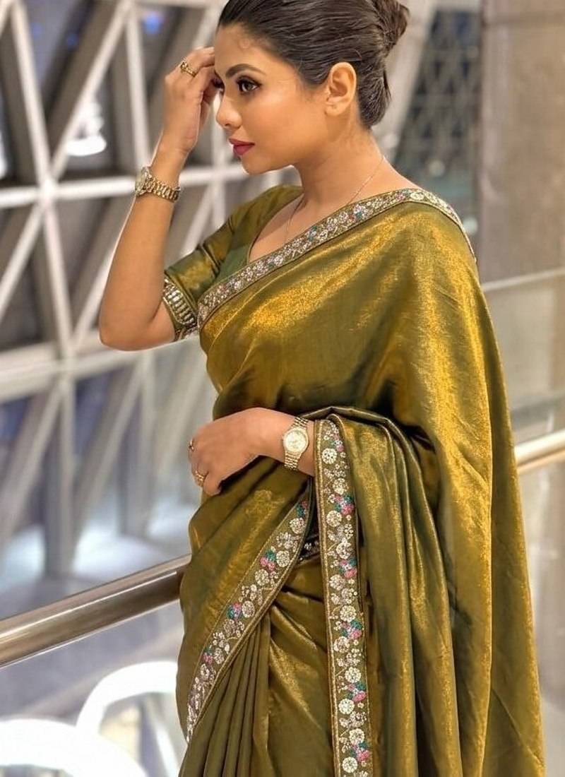 Entrancing green beads sequins and cut-dana embroidered fendy satin festival saree