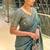 Dreamy blue beads sequins and cut-dana embroidered fendy satin wedding and party wear saree