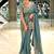 Dreamy blue beads sequins and cut-dana embroidered fendy satin wedding and party wear saree