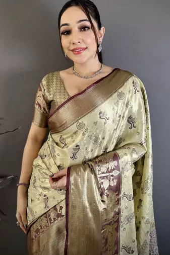 Olive kanjeevaram silk blend woven design saree with unstitched blouse piece