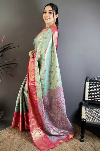 Sea green kanjeevaram silk blend woven design saree with unstitched blouse piece