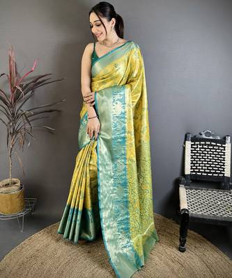 Yellow kanjeevaram silk blend woven design saree with unstitched blouse piece 1