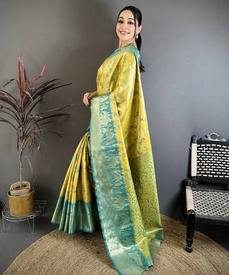 Yellow kanjeevaram silk blend woven design saree with unstitched blouse piece 2