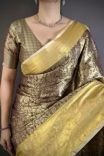 Brown kanjeevaram silk blend woven design saree with unstitched blouse piece
