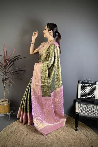 Bottle green kanjeevaram silk blend woven design saree with unstitched blouse piece