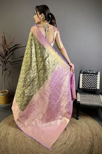 Bottle green kanjeevaram silk blend woven design saree with unstitched blouse piece