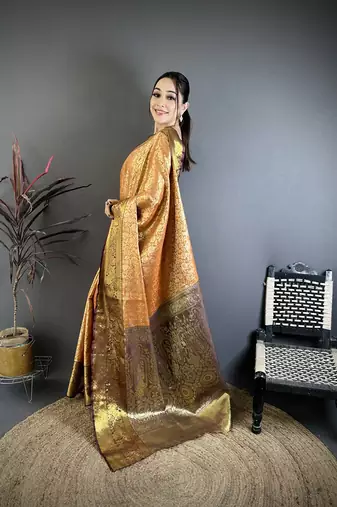 Orange kanjeevaram silk blend woven design saree with unstitched blouse piece