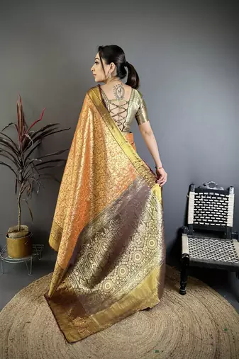 Orange kanjeevaram silk blend woven design saree with unstitched blouse piece