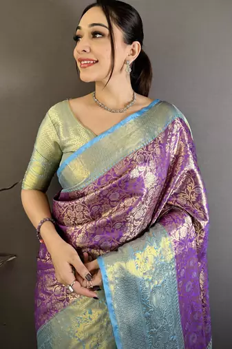 Purple kanjeevaram silk blend woven design saree with unstitched blouse piece
