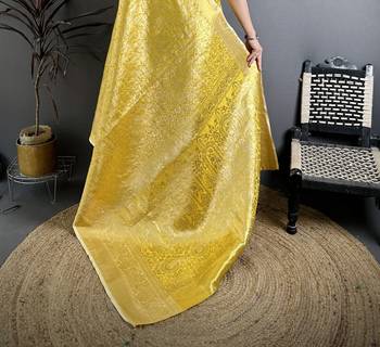 Yellow kanjeevaram silk blend woven design saree with unstitched blouse piece 5