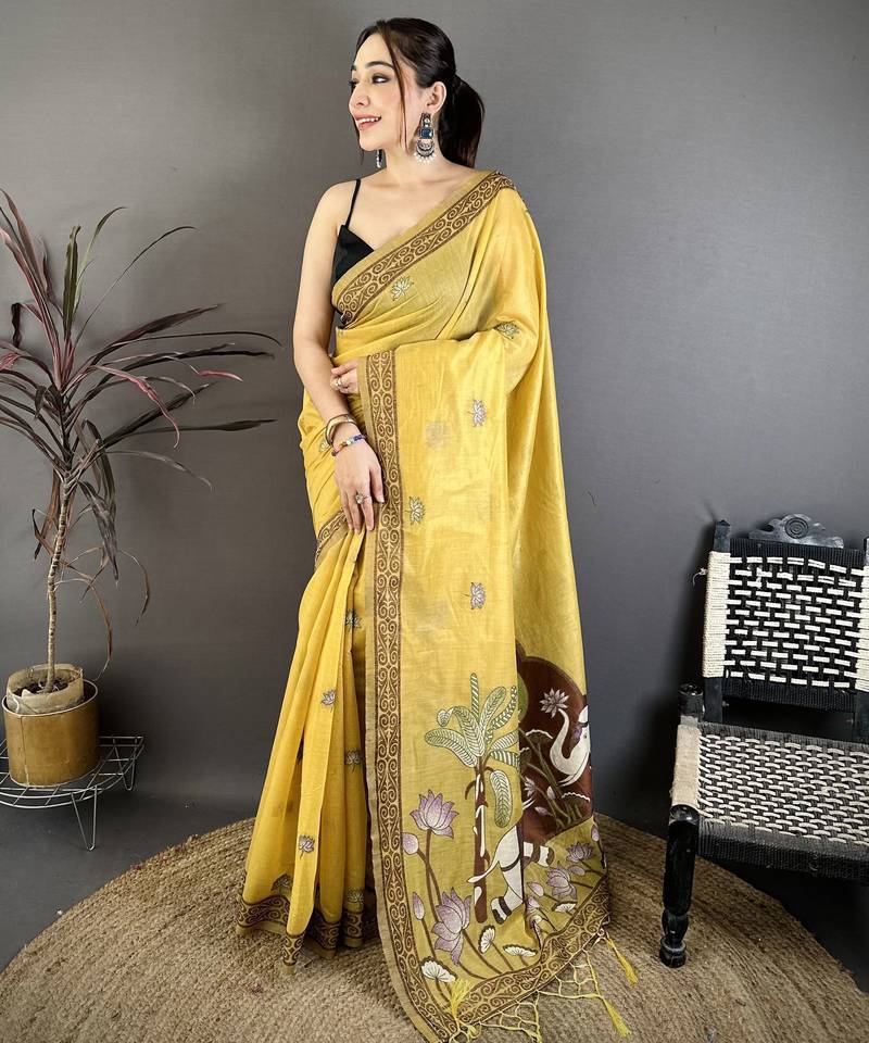 Yellow cotton woven design saree with unstitched blouse piece