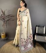 Cream cotton woven design saree with unstitched blouse piece