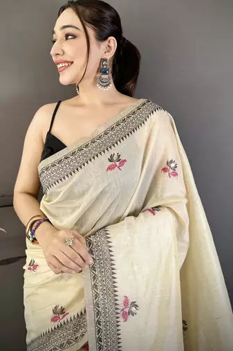 Cream cotton woven design saree with unstitched blouse piece
